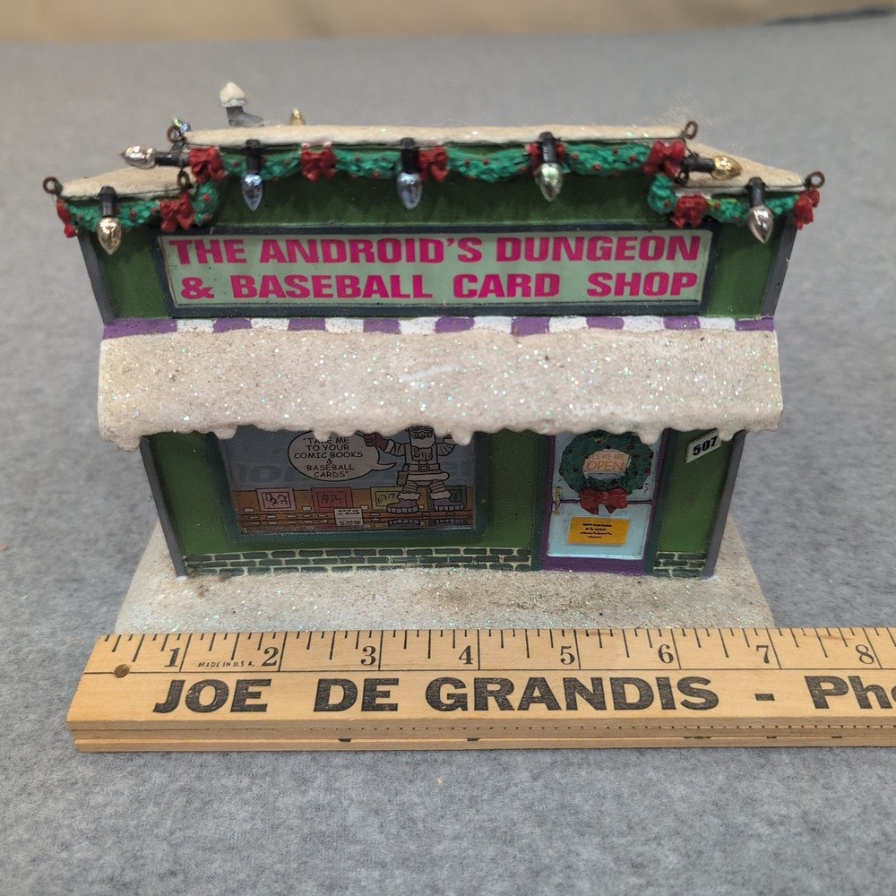 The Simpsons Android's Dungeon Baseball Card Shop Christmas Village Building - Picture 3 of 7